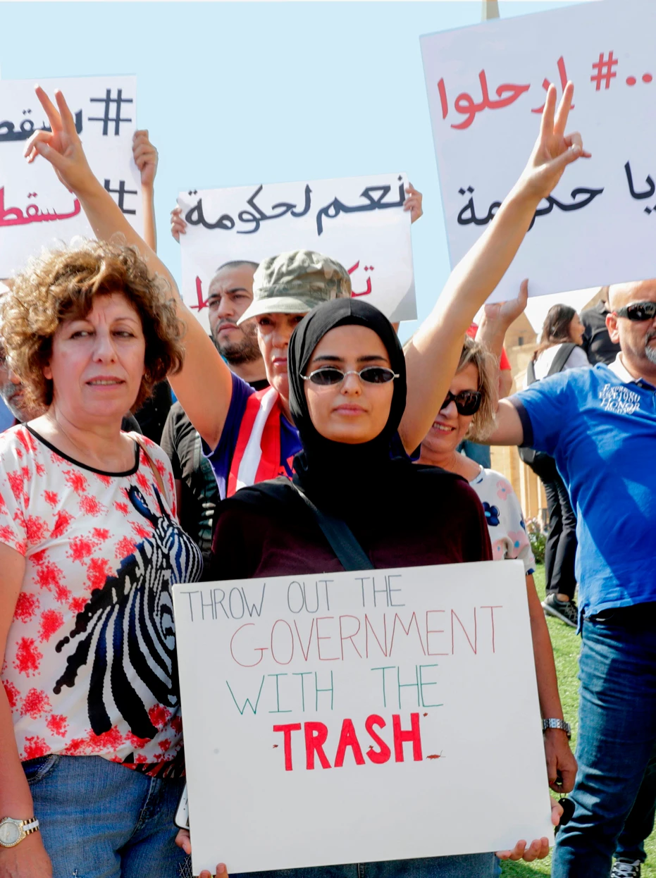 Protesters hold placards during a recent demonstration in Beirut. AFP