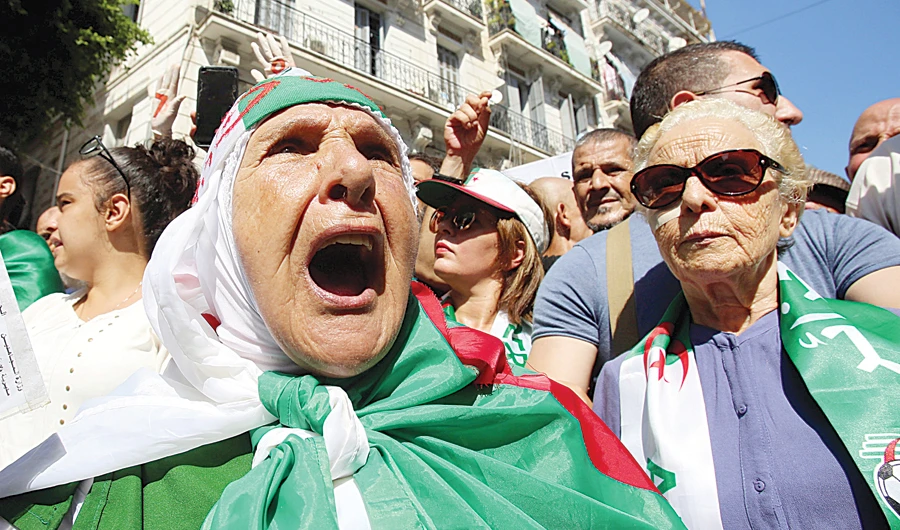 An elderly woman shouts slogans during a recent protest in Algiers. (Reuters)