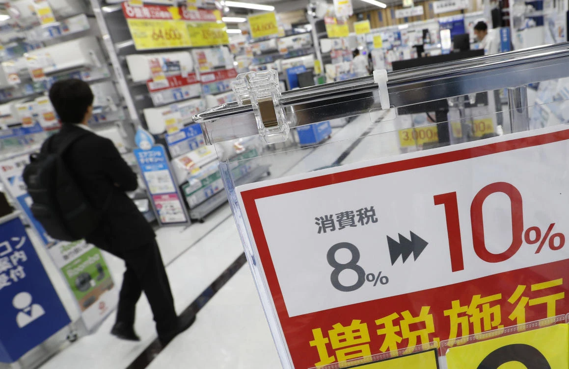 Japan raises sales tax to 10% amid signs economy weakening