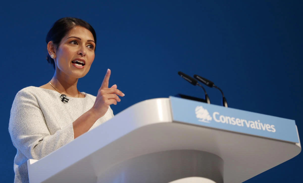 Britain's Home Secretary Priti Patel addresses the delegates at the Conservative Party Conference in Manchester, England, Tuesday, Oct. 1, 2019. Britain's ruling Conservative Party is holding their annual party conference.(AP)
