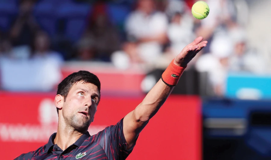 Djokovic back to winning ways after US Open injury