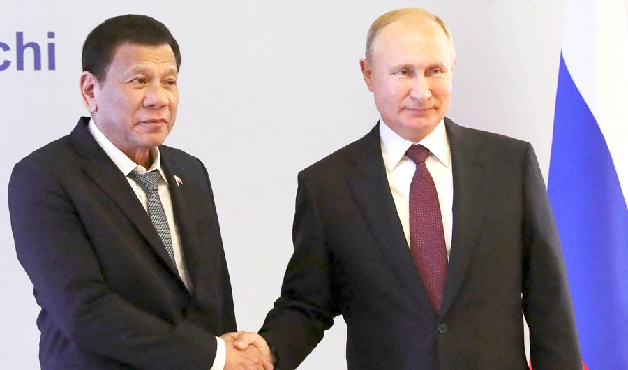 Russian President Vladimir Putin greets Philippine President Rodrigo Duterte during their meeting in the Black Sea resort of Sochi. (AP)