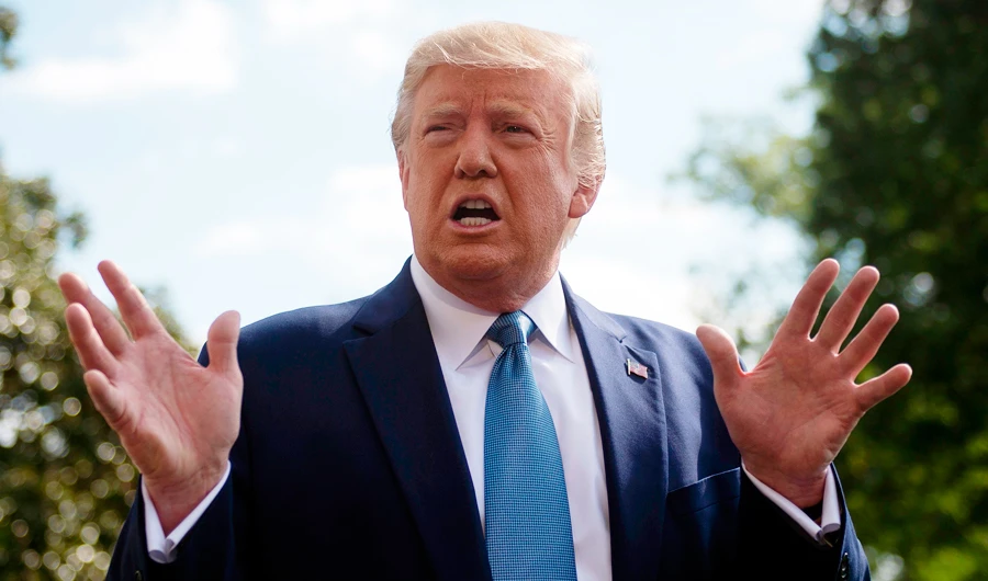 US President Donald Trump speaks to the press as he departs the White House in Washington, DC, for his annual visit to Walter Reed National Military Medical Center, on October 4, 2019. (AFP)