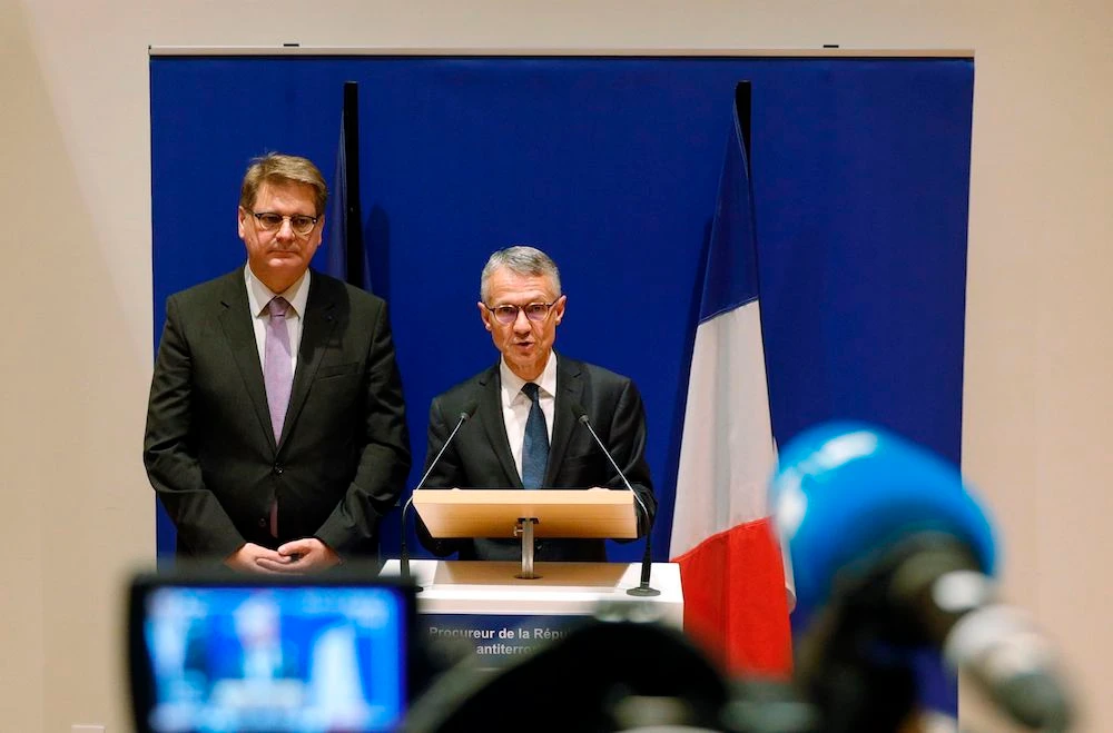 Paris police attacker had contacts with extremists