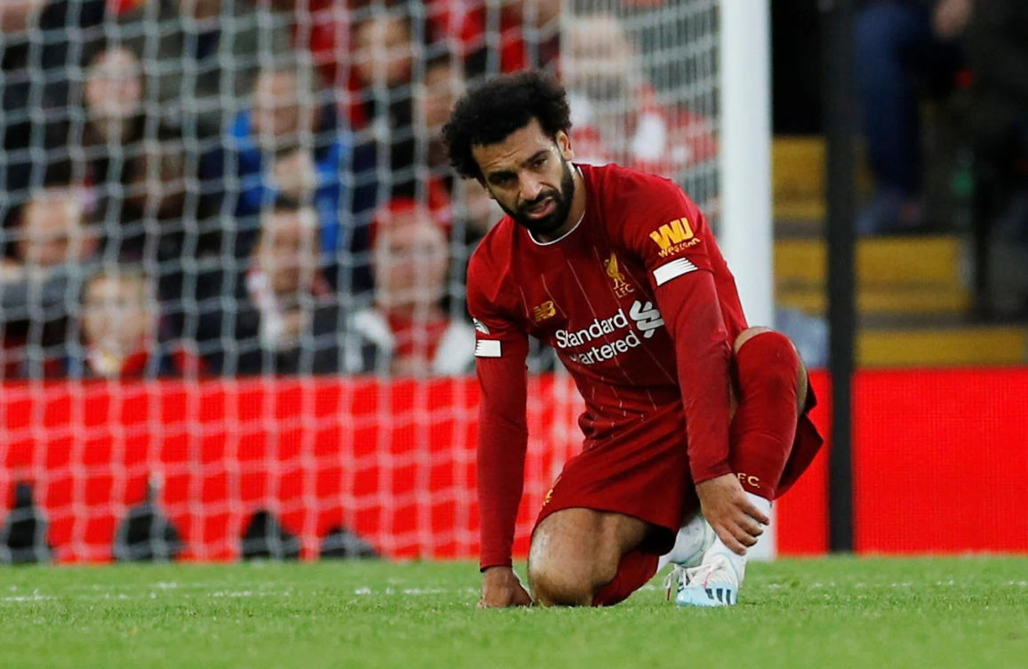 Mo Salah limped out of the stadium with what appeared to be an ankle injury. (Reuters)
