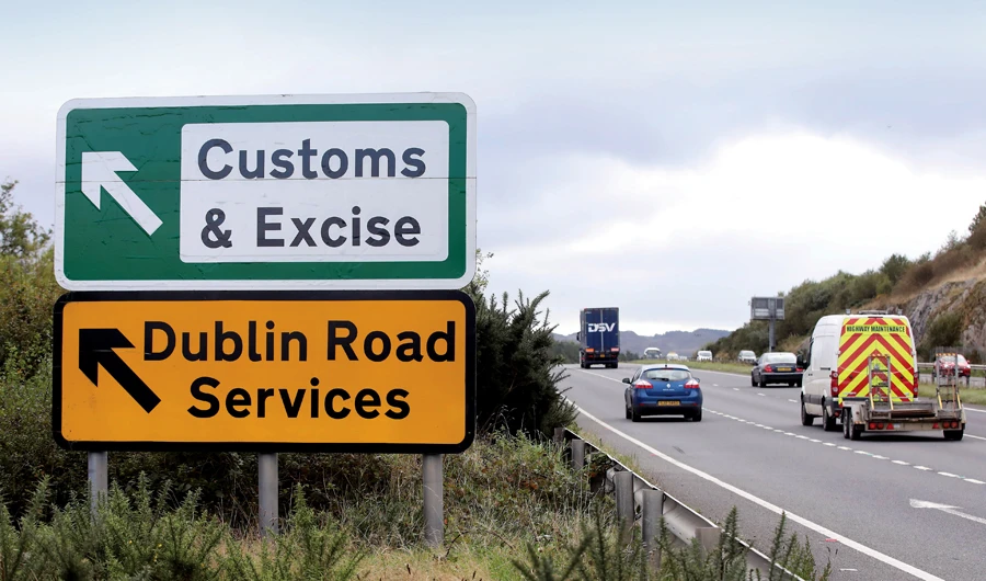 Signs point to an old customs and excise area on the Dublin road in Newry, Northern Ireland, on the border between Northern Ireland and the Irish Republic. (AFP)