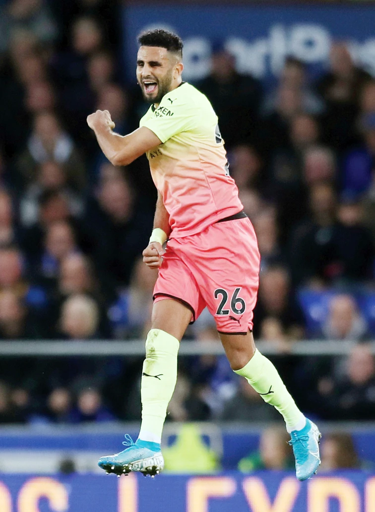 Manchester City’s Riyad Mahrez celebrates scoring a goal from a free kick during a recent match. (Reuters)
