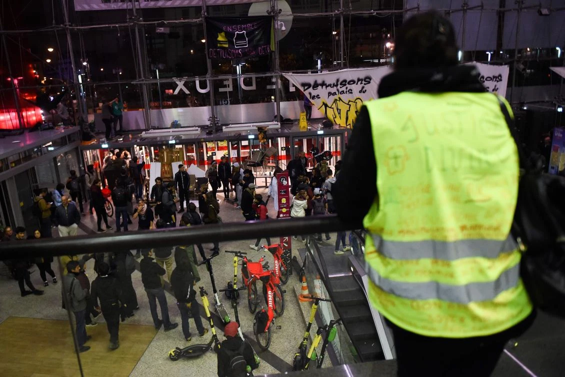A yellow vest stands as protesters stay inside the Italie Deux shopping mall in Paris on Saturday, October 5, 2019. (AFP)