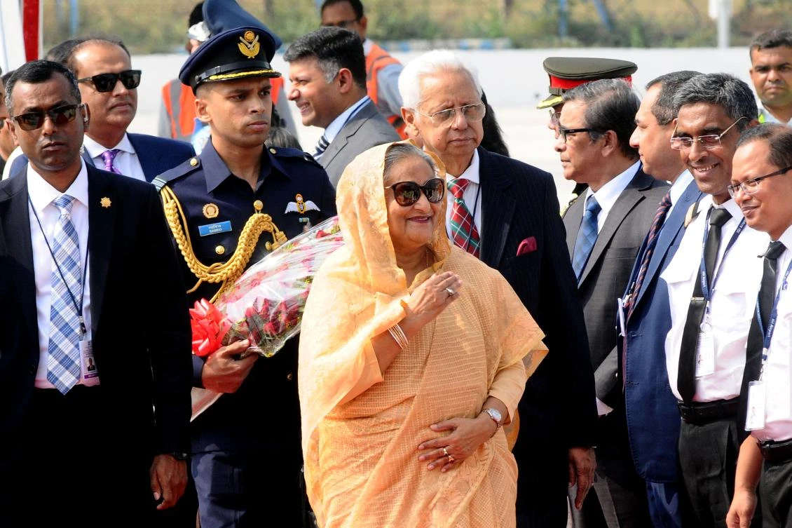 Prime Minister Sheikh Hasina, center, last month launched an anti-corruption crackdown, saying it was necessary to prevent a repeat of the January 2007 coup by the military. (AFP)
