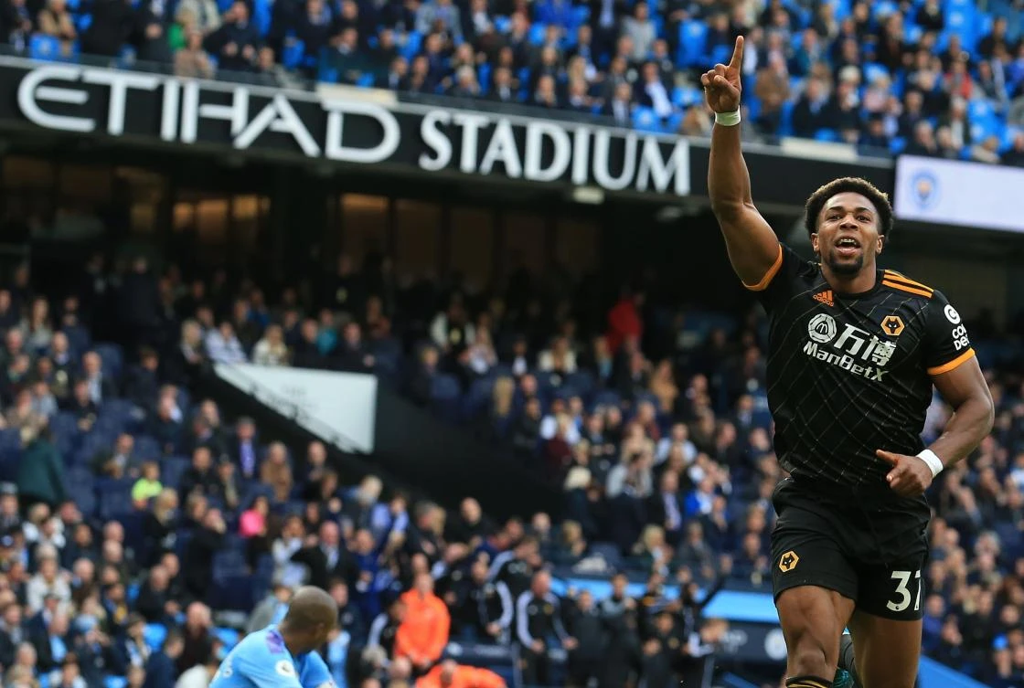 Wolverhampton Wanderers' Spanish striker Adama Traore celebrates scoring his team's second goal during the Premier League match against Manchester City at the Etihad Stadium. (AFP)