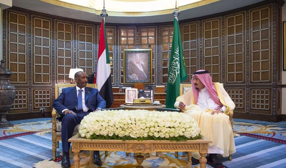 Saudi Arabia's King Salman received the president of the Sudanese sovereignty council as well as the country's prime minister on their first joint foreign visit on Sunday. (SPA)