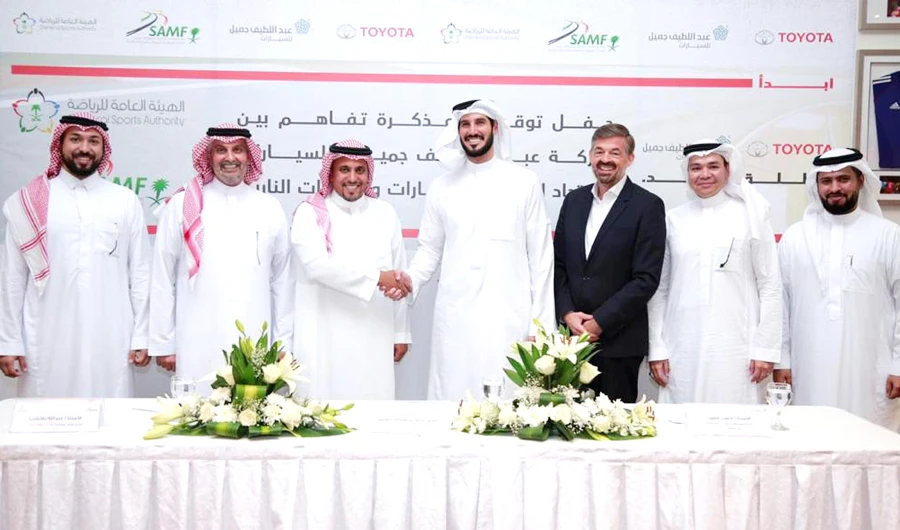 The agreement was signed by Prince Khalid S. Al-Faisal, Abdullah S. Bakhashab, and Hassan Jameel at the Saudi Automobile Federation headquarters in Jeddah.