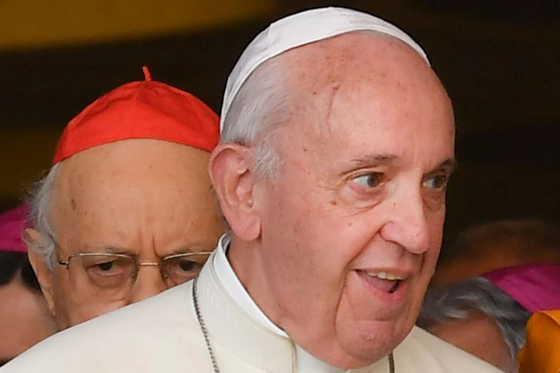 Secretary of the Congregation for Bishops, Italian cardinal Lorenzo Baldisseri (Rear L) and Pope Francis leave for a lunch break after attending the opening of the Special Assembly of the Synod of Bishops for the Pan-Amazon Region on October 7, 2019 in the Vatican. (AFP)