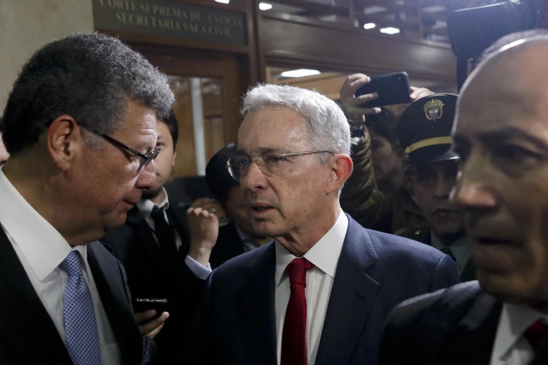Former president Alvaro Uribe arrives to the Supreme Court for questioning in a case an involving witness tampering in Bogota, Colombia, Tuesday, Oct. 8, 2019. (AP)