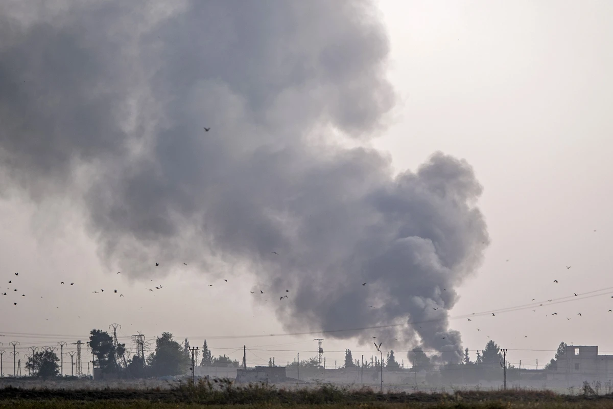 Smoke rises from the Syrian town of Tal Abyad after Turkish bombings, as part of an offensive against Kurdish fighters launched Monday. (AFP)