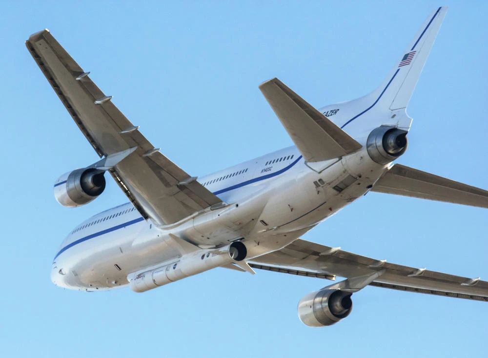 In this Oct. 1, 2019 photo made available by NASA, a Northrop Grumman L-1011 Stargazer aircraft takes off from Vandenberg Air Force Base in California. The company's Pegasus XL rocket, containing NASA's Ionospheric Connection Explorer (ICON), is attached beneath the aircraft. (Randy Beaudoin/NASA via AP)