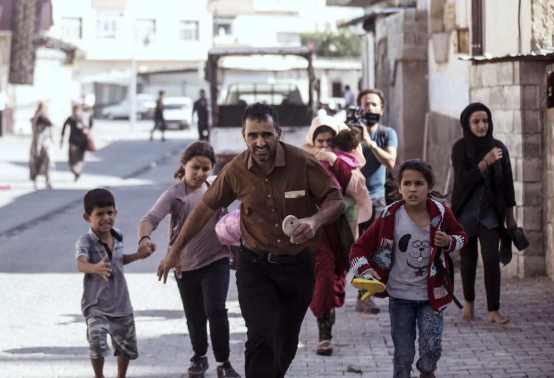The UN’s Office for the Coordination of Humanitarian Affairs estimated that 70,000 people have been newly displaced since Ankara launched its operation. (IHA via AP)