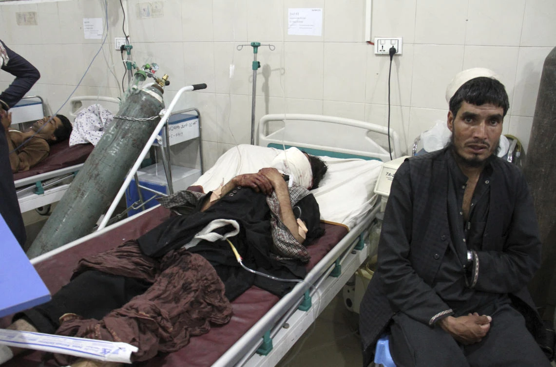 Wounded men receive treatment at a hospital after a bomb blast in Nangarhar, province east of Kabul, Afghanistan. (File/AP/Wali Sabawoon)