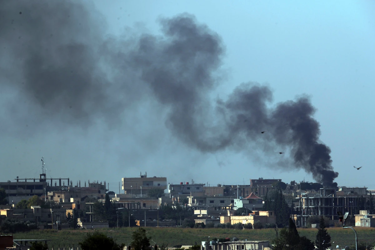 Smoke billows from targets in Tel Abyad, Syria, during bombardment by Turkish forces, Friday, Oct. 11, 2019. (AP)