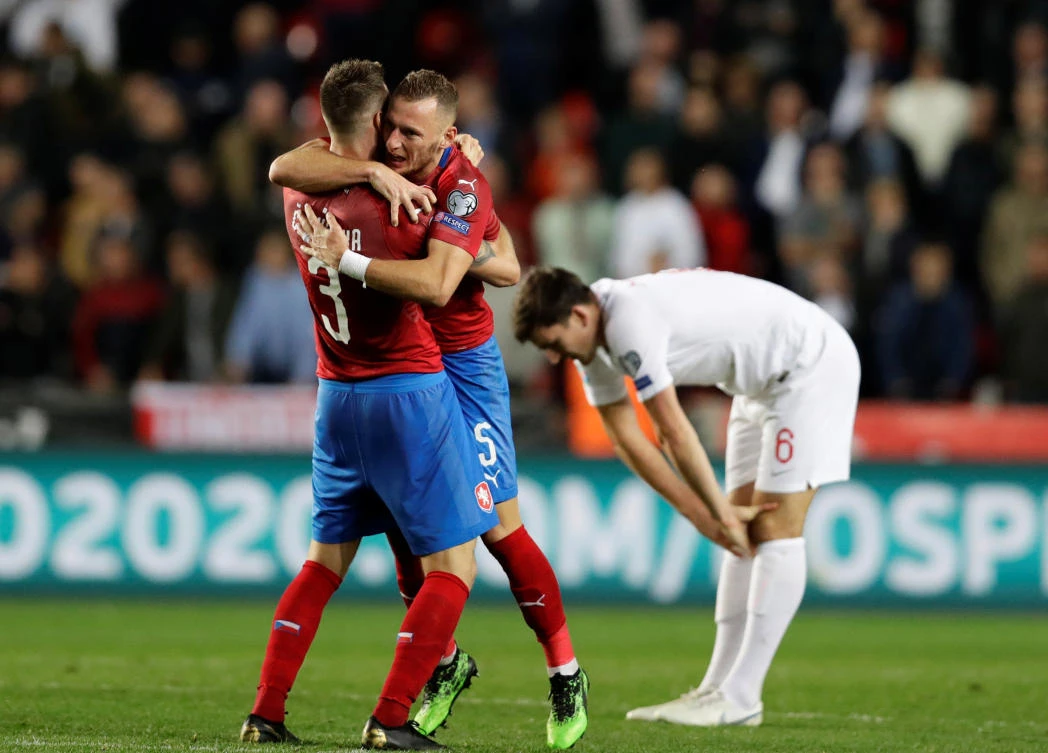 Czech Republic’s Ondrej Celustka and Vladimir Coufal celebrate after the 2 — 1 victory over England. (Reuters)