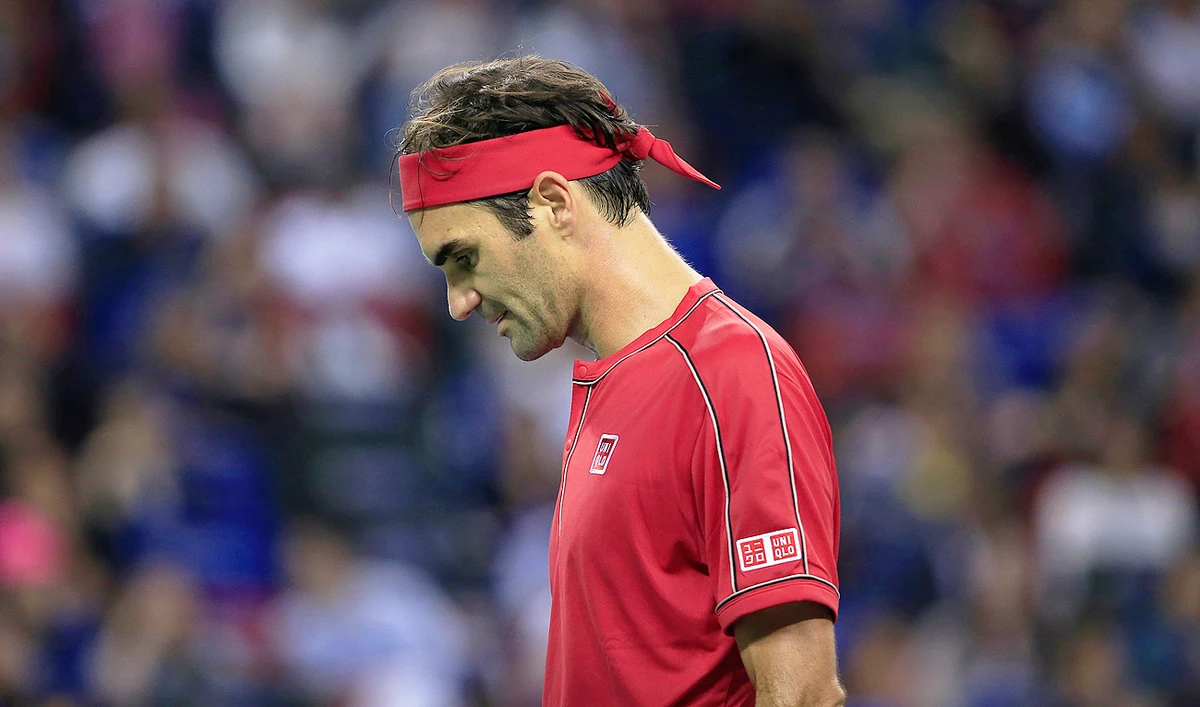 Federer became engaged in a continual war of words with the umpire. (Reuters)