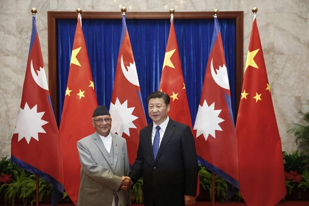 The Chinese Presidentand Xi Jinping, right, met with Nepalese Prime Minister K.P. Sharma Oli, left, in Beijing in 2016. (File/AFP)