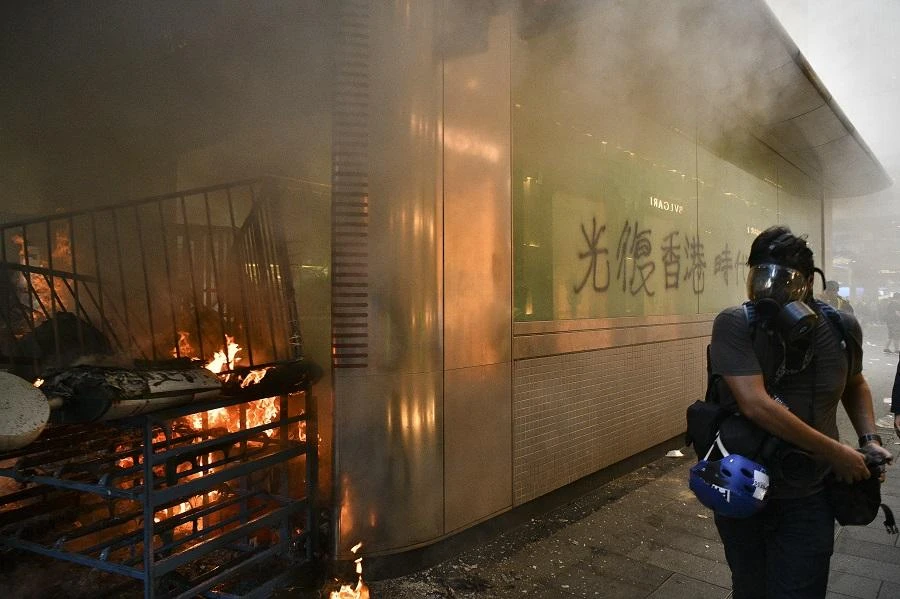 Smoke billows from an exit of the Central MTR underground metro station after it was set alight during a protest in Hong Kong on September 8, 2019. (File/AFP)
