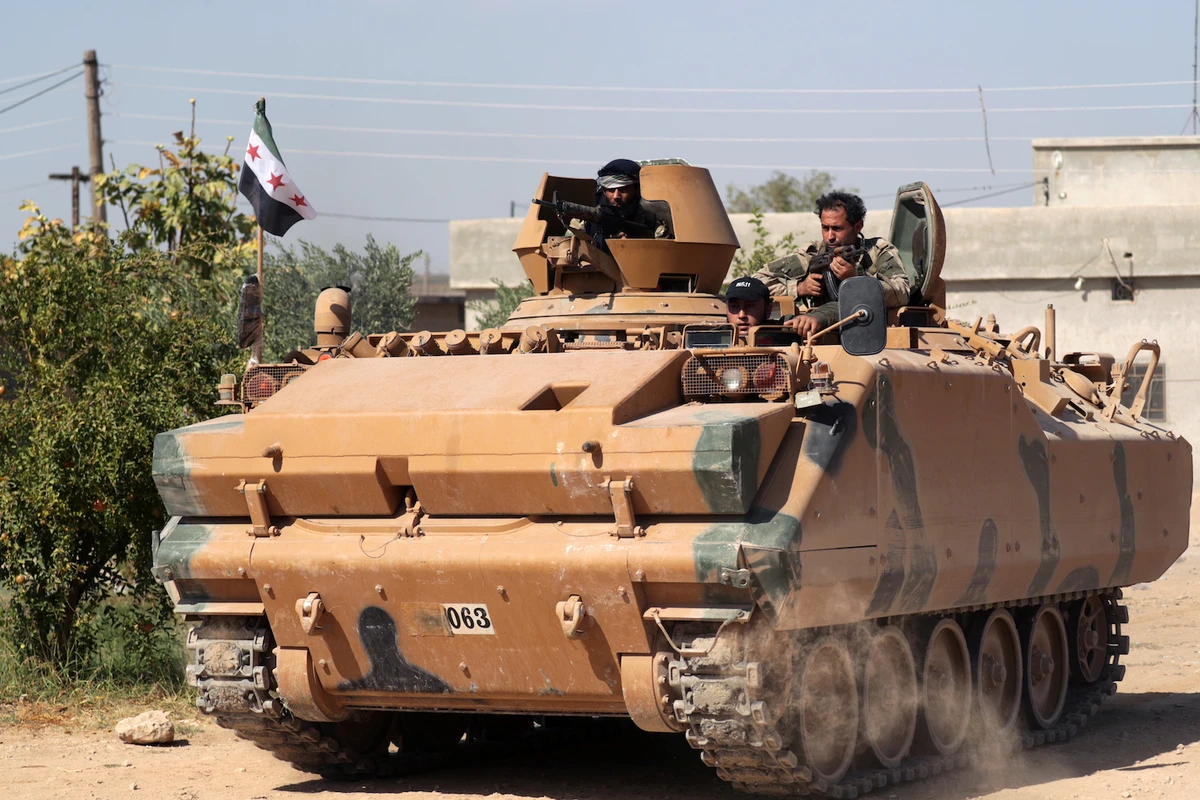 Pro-Turkey rebels 'execute' 9 civilians in Syria
