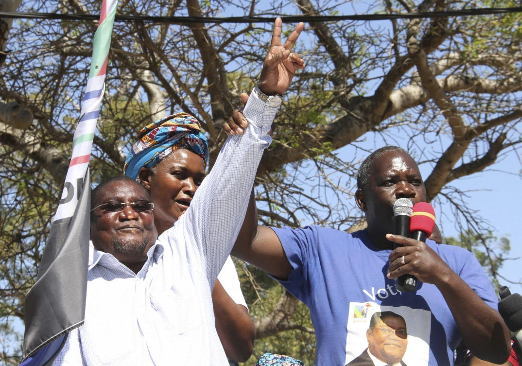 In this photo taken Tuesday, Sept. 10, 2019 opposition Renamo leader, Ossufo Momade, left, greets supporters at an election rally in Maputo, Mozambique. (AP)