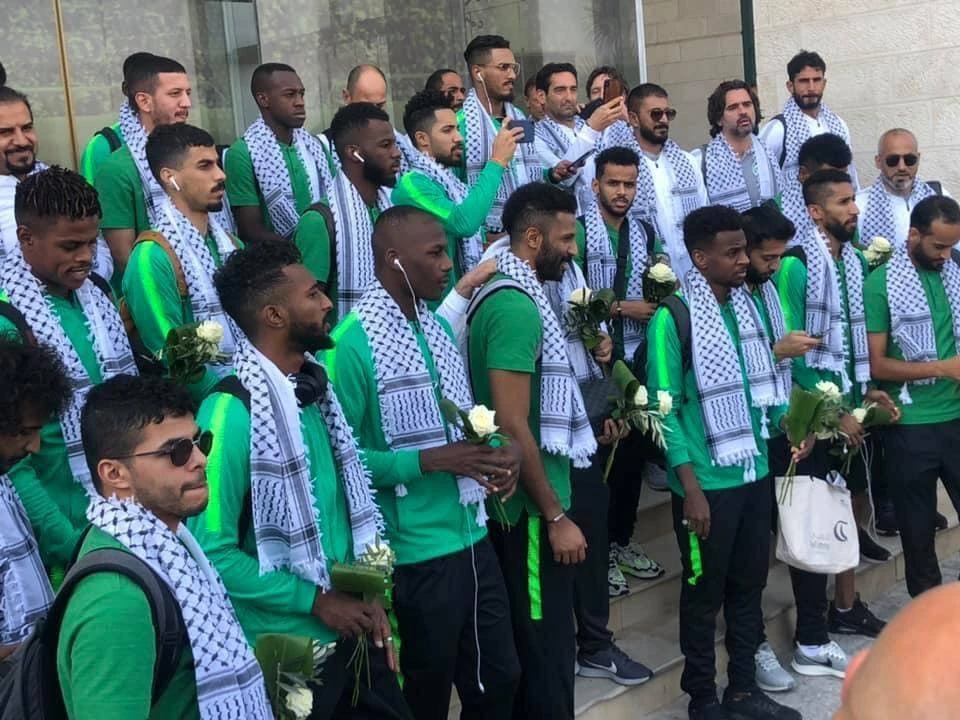 The Saudi Arabian national team arrived in Ramallah on Sunday ahead of their 2022 World Cup qualifying match against Palestine to a heroes’ welcome. (Twitter/Screenshot)
