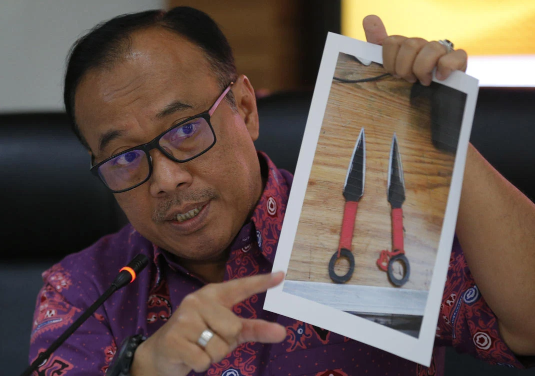 Indonesia arrests 22 militants following attack on minister