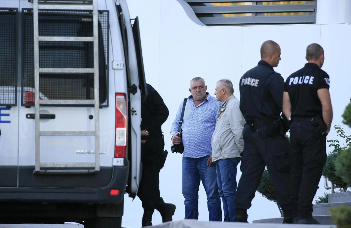 Police seen entering the new building of Bulgarian Football Union, Tuesday, Oct. 15, 2019. Criticized around Europe for the racist behavior of Bulgarian fans and under pressure from the country's prime minister, the president of the country's soccer federation resigned on Tuesday. (AP)