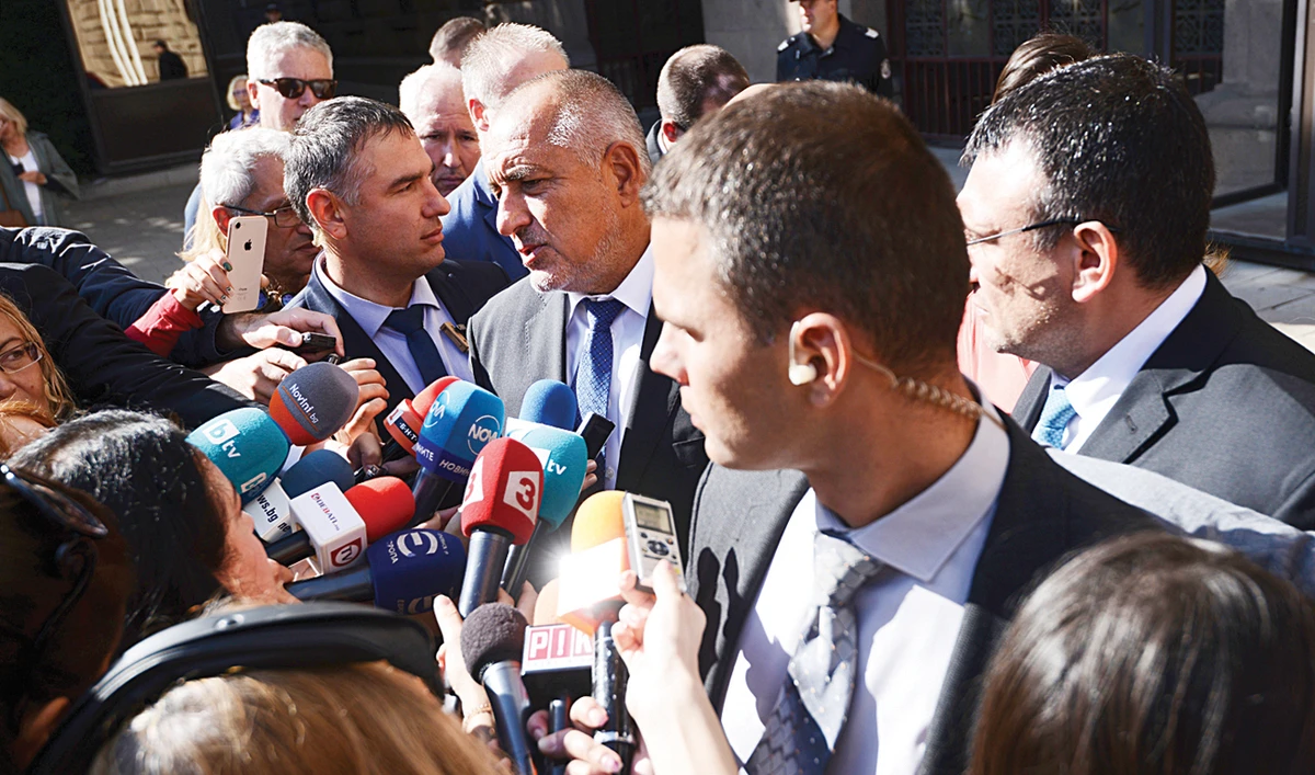 Prime Minister Boyko Borisov talks to journalists at the Bulgarian President's office. (AP)