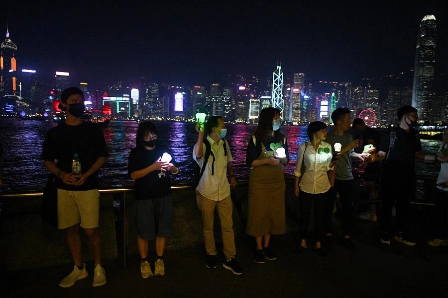People form a human chain in the harbour area in Hong Kong on September 30, 2019. (File/AFP)