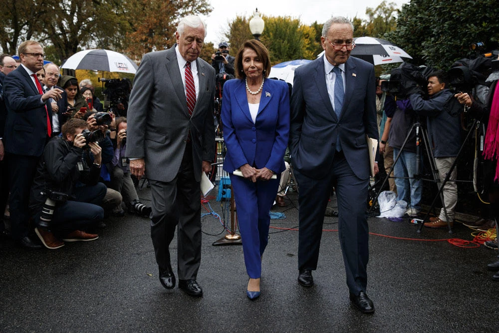 Speaker of the House Nancy Pelosi of California, center, Senate Minority Leader Sen. Chuck Schumer, right, and House Majority Leader Steny Hoyer, walk from the microphones after speaking with reporters following a meeting with President Donald Trump at the White House on Oct. 16, 2019, in Washington. (AP Photo/Evan Vucci)