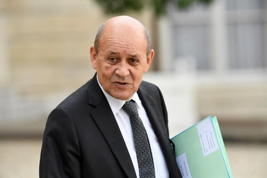 The French FM Jean-Yves Le Drian wants to find a way to have a judicial mechanism that is able to judge Daesh fighters. (File/AFP)