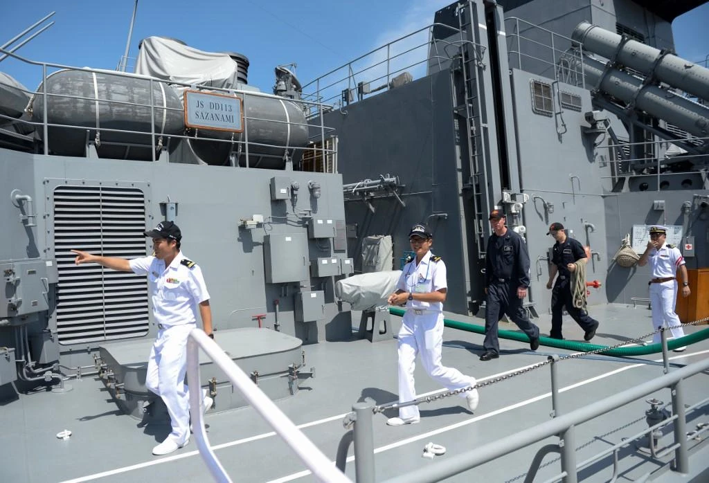 Sailors walk on the deck Japan’s missile destroyer JS Sazanami in this July 10, 2017 file photo. (AFP)