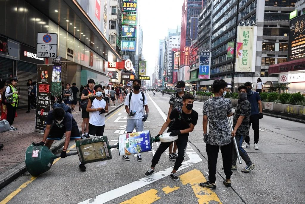 Tourists are scared off by the protests which have at times caused disruptions of traffic and public transport. (File/AFP)