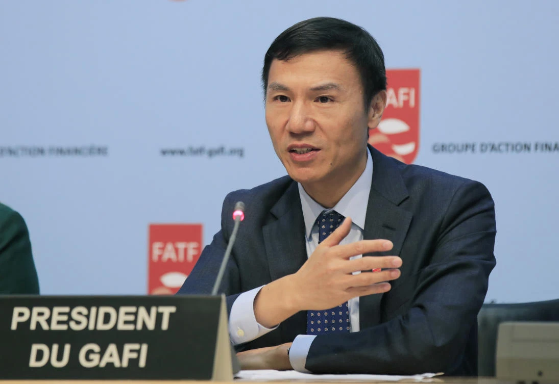 Financial Action Task Force (FATF) President Xiangmin Liu gestures as he speaks during a media conference at the OECD headquarters in Paris. (AP)