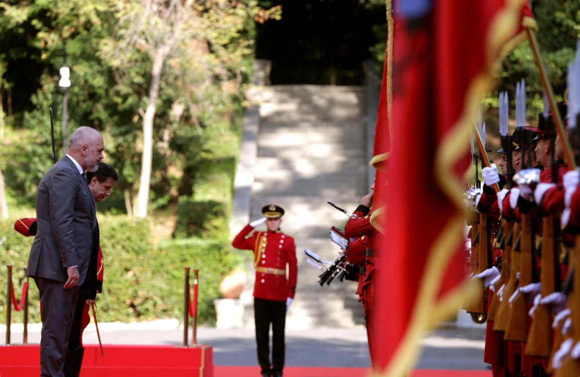 Italian Prime Minister Giuseppe Conte and his Albanian counterpart Edi Rama review the guard of honor during a welcoming ceremony at the Palace of Brigades in Tirana, Albania. (Reuters)