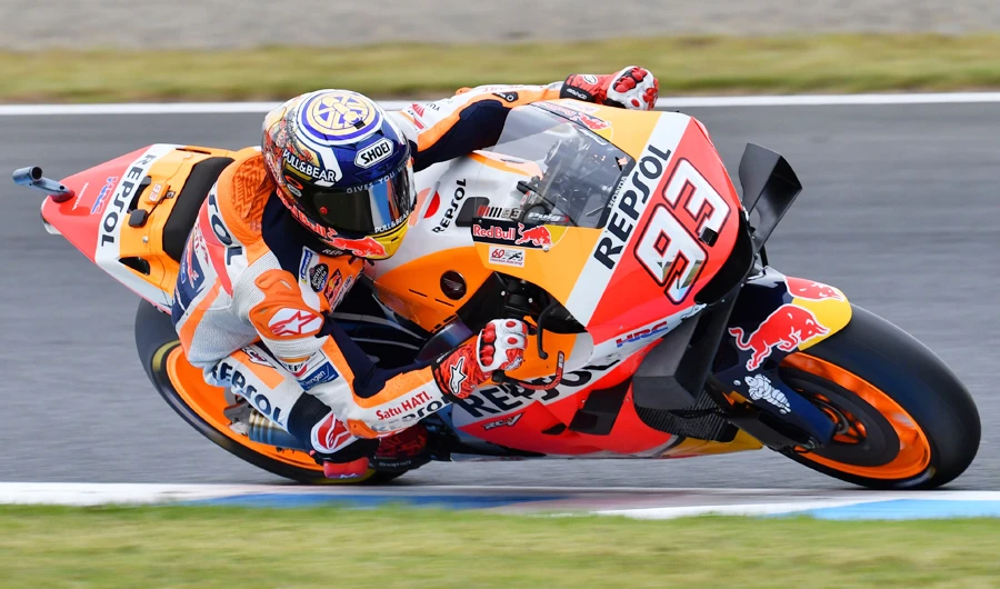 Repsol Honda Team rider Marc Marquez of Spain takes a corner during the second free practice session at the Twin Ring Motegi circuit in Motegi, Tochigi prefecture on October 18, 2019. (AFP)