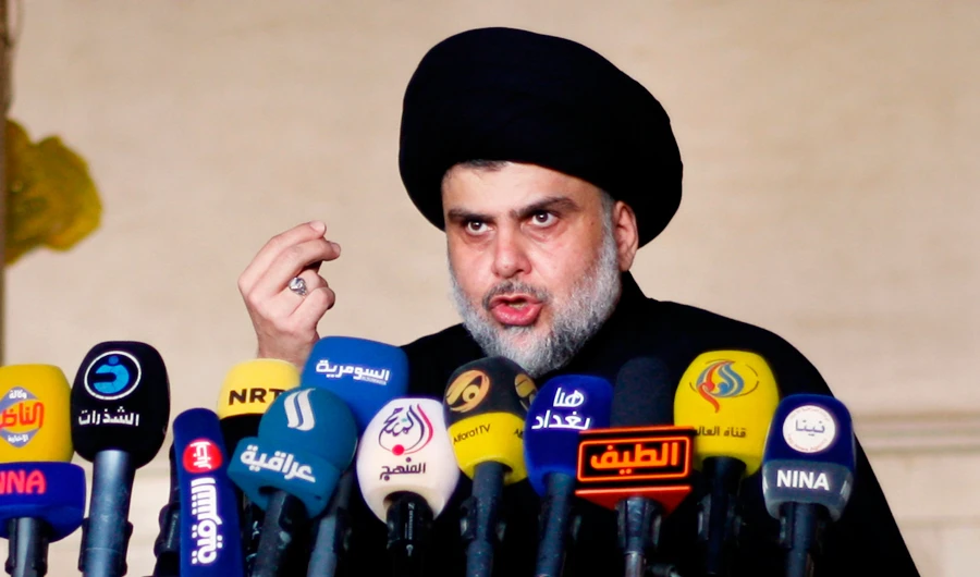 Iraqi Shiite cleric Moqtada al-Sadr delivers a speech during Friday prayer at the Great Mosque of Kufa, 10 kilometres northeast of the shrine city of Najaf in central Iraq on November 17, 2016. (AFP)
