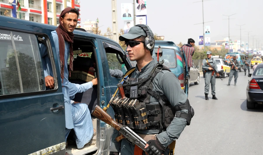 In this Sept. 26, 2019 photo, Afghan policemen stand guard at a checkpoint in Kabul, Afghanistan. (AP)