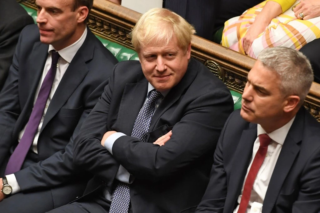 Johnson was ambushed by opponents in parliament on Saturday who demanded a change to the sequencing of the ratification of the deal, exposing the prime minister to a law which demanded he request a delay until Jan. 31. (File/AFP)