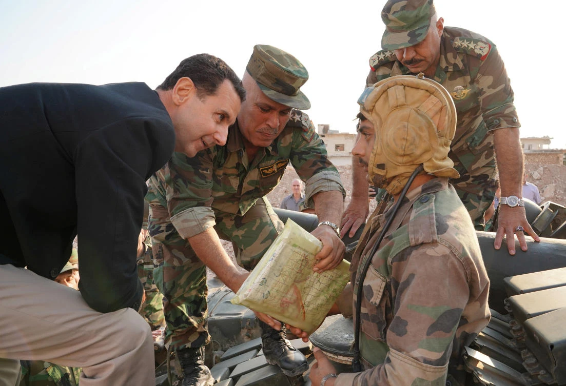 Syrian President Bashar Al-Assad visits Syrian army troops in war-torn northwestern Idlib province, Syria. (Reuters)