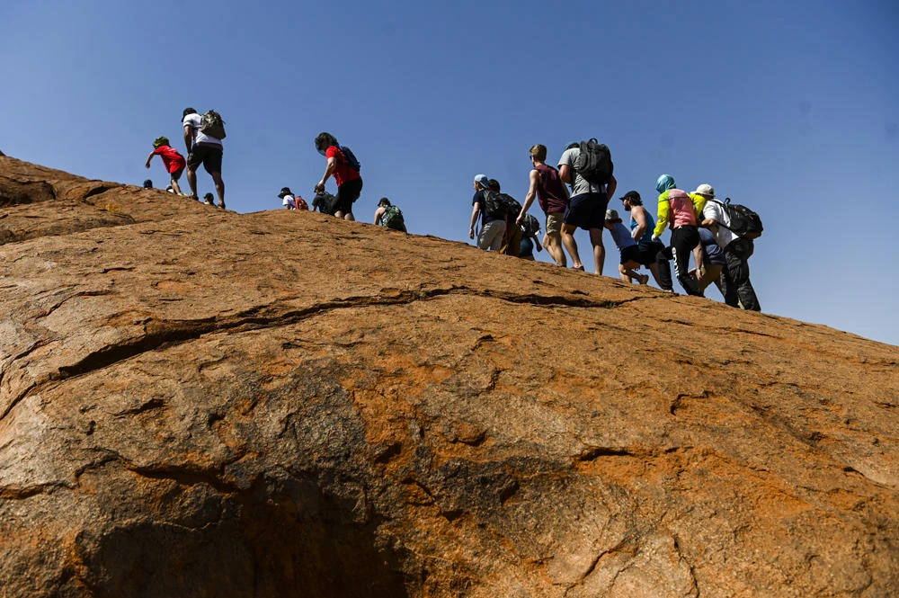 Tourists flock to Australia’s Uluru for last ever climb