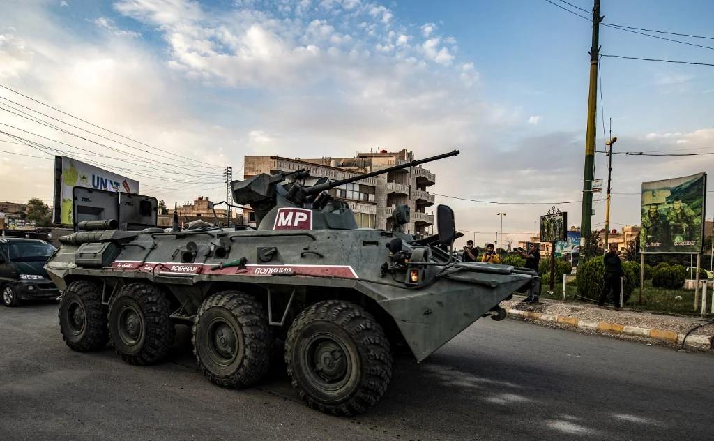 More than 20 Russian armored vehicles were sent to Syria to help with the evacuation. (File/AFP)