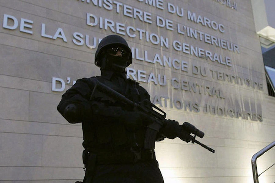 A Moroccan policeman stands guard at the Central Bureau of Judicial Investigation office in Sale. (Reuters)