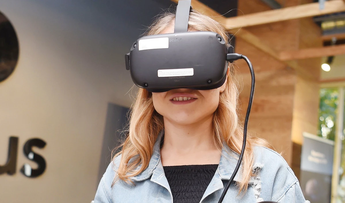 A Facebook employee tries out an Oculus device at the company’s corporate headquarters campus in California. (AFP)