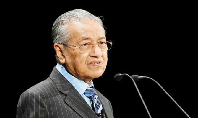 Malaysia PM Mahathir  defends attending race-based forum